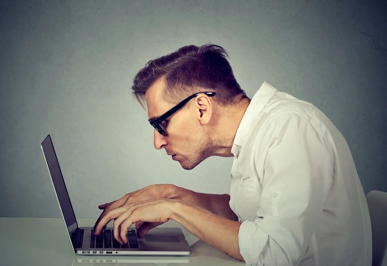 Trader focused on laptop
